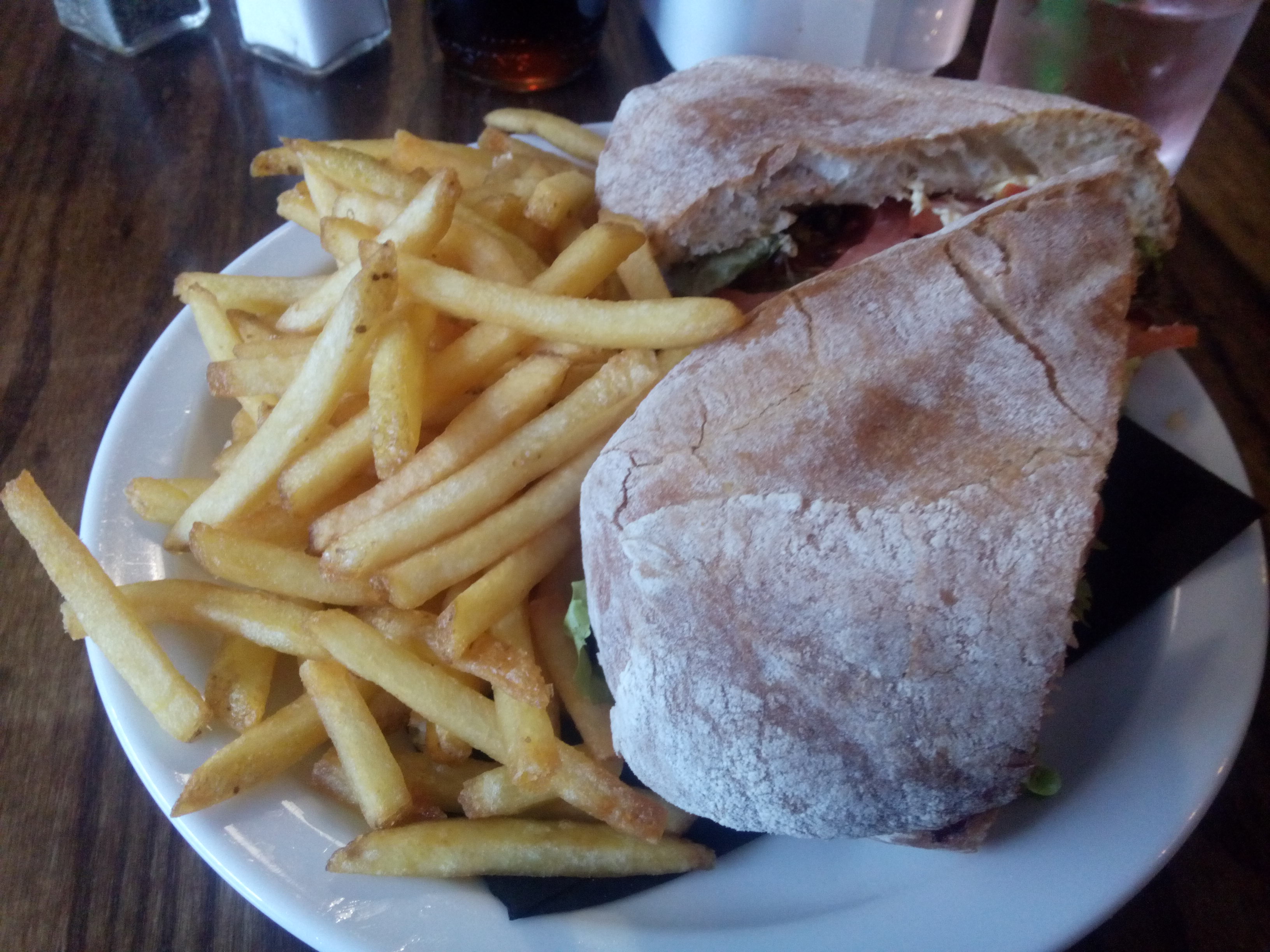 Thin fries and a panino on a plate